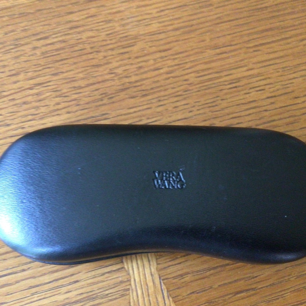 Vera Wang sunglasses in the case.  Great condition.